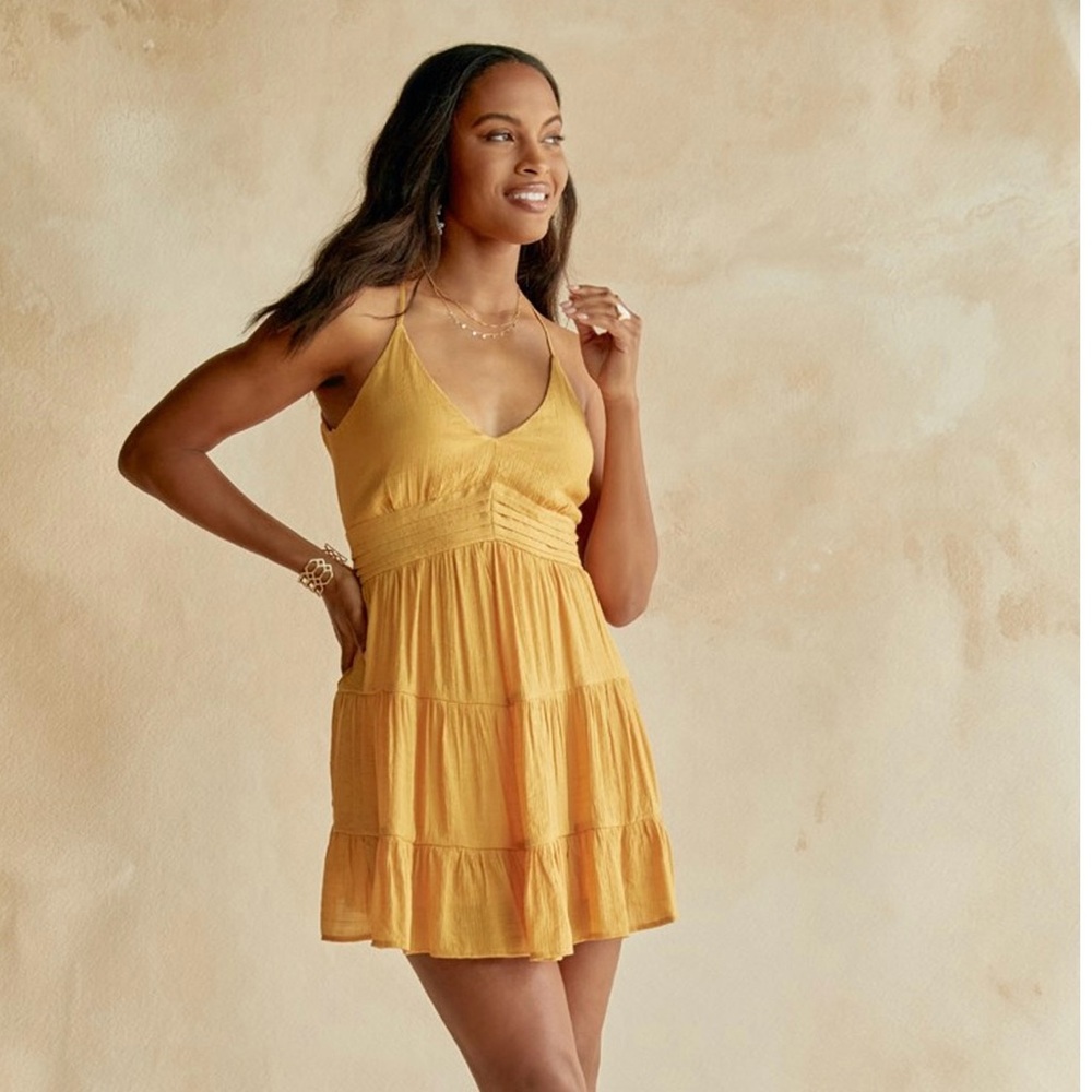 Get summer ready with this adorable YELLOW v-neck dress from Francesca’s!
